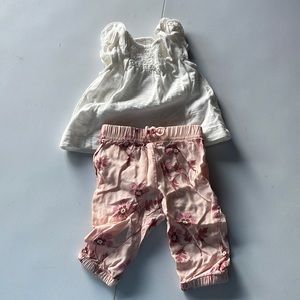 Carter’s newborn flowered pants with white eyelet shirt